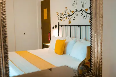 Cama o camas de una habitación en Hotel Oaxaca Real