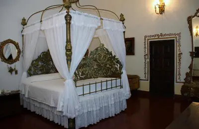 Cama o camas de una habitación en Hotel Hacienda Vista Hermosa