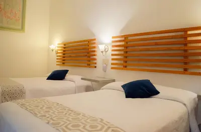 Cama o camas de una habitación en Vf Hotel