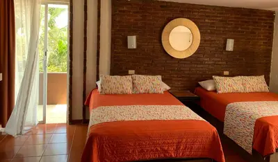 Cama o camas de una habitación en VF Villa Florencia Hotel