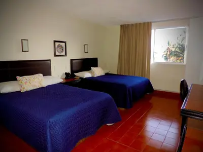 Cama o camas de una habitación en VF Villa Florencia Hotel
