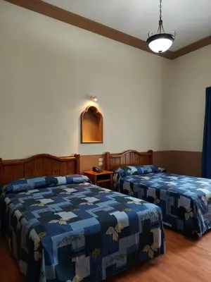 Cama o camas de una habitación en Hotel de Talavera