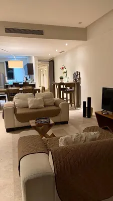 Una televisión o centro de entretenimiento en Departameto en Residencial La Isla Acapulco Torre G