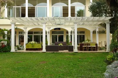 Jardín al aire libre en Villa Las Margaritas Caxa