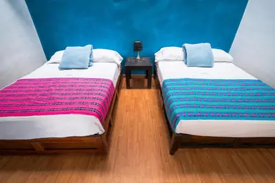 Cama o camas de una habitación en Hostal Santo Domingo