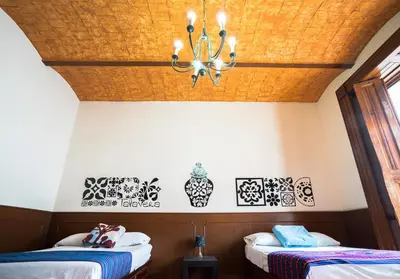 Cama o camas de una habitación en Hostal Santo Domingo