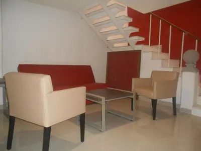 Zona de estar de Hotel Puente Real