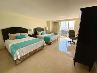 Cama o camas de una habitación en Astur Hotel & Residence
