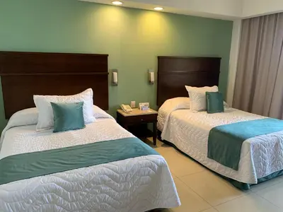 Cama o camas de una habitación en Hotel Bello Veracruz