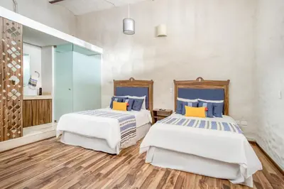 Cama o camas de una habitación en Hotel Milagro, Puebla Centro