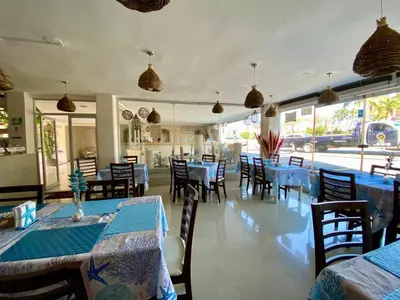Un restaurante o sitio para comer en Hotel Playa de Oro - Enfrente de WTC y Plazas Comerciales