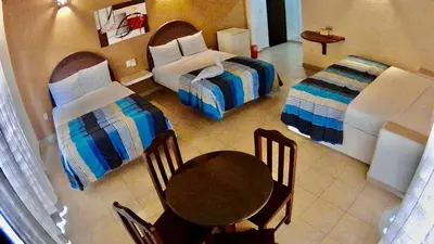 Cama o camas de una habitación en Hotel Bahia Huatulco