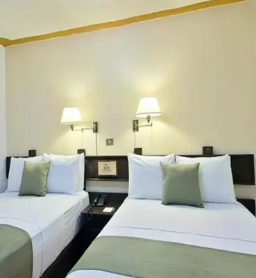 Cama o camas de una habitación en Hotel Misión Xalapa