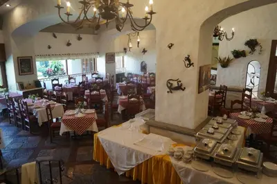 Un restaurante o sitio para comer en Hotel Argento