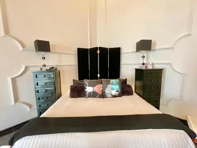 Cama o camas de una habitación en El Sueño Hotel & Spa