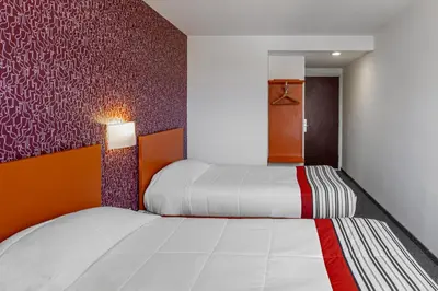 Cama o camas de una habitación en City Express Junior by Marriott Tuxtla Gutierrez Poliforum