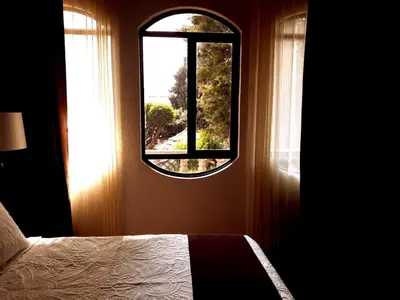 Cama o camas de una habitación en Hotel Boutique La Albertina