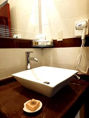 Un baño de Hotel Boutique La Albertina