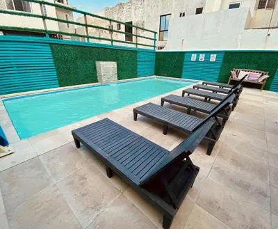 Piscina en o cerca de Loft Frente a la Playa!!!!