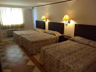 Cama o camas de una habitación en Hotel Acuario de Veracruz