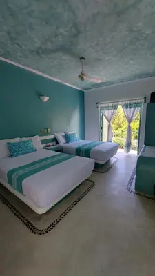 Cama o camas de una habitación en Delphinus Inn