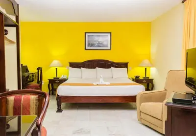 Cama o camas de una habitación en Hotel Madan Cárdenas
