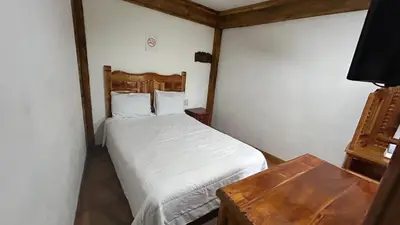 Cama o camas de una habitación en Hotel Colonial Taxco