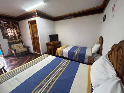 Cama o camas de una habitación en Hotel Colonial Taxco