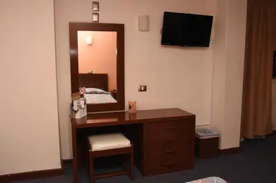 Una televisión o centro de entretenimiento en Hotel Maria Victoria Xalapa