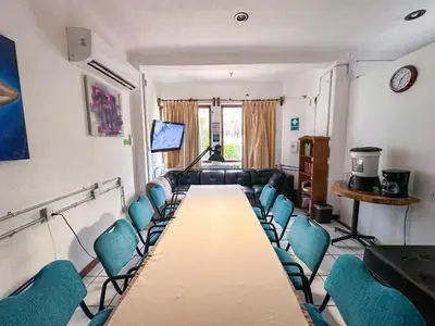 Una televisión o centro de entretenimiento en Best Western Posada Chahue