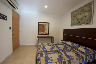 Cama o camas de una habitación en Hotel Oaxaca Inn Express