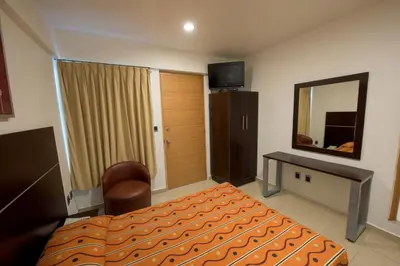 Cama o camas de una habitación en Hotel Oaxaca Inn Express