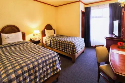 Cama o camas de una habitación en Hotel Lastra