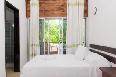 Cama o camas de una habitación en Bungalows Zicatela