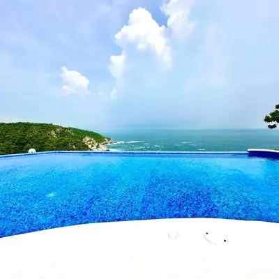 Bungalow frente a la playa estrene alberca nueva con increíble vista infinita al mar