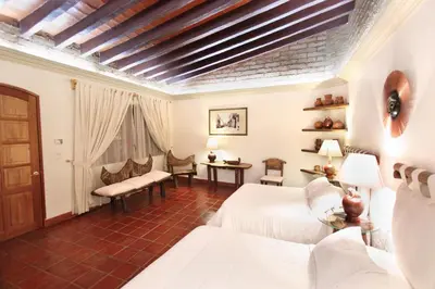 Cama o camas de una habitación en Hotel Boutique La Casa Azul