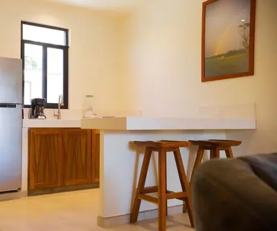 Una cocina o zona de cocina en Bungalows Oasis