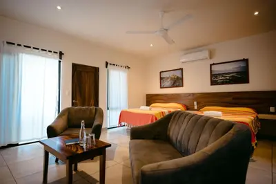 Cama o camas de una habitación en Bungalows Oasis
