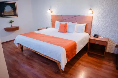 Cama o camas de una habitación en Hotel Del Angel, Apizaco