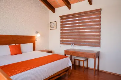 Cama o camas de una habitación en Hotel Del Angel, Apizaco