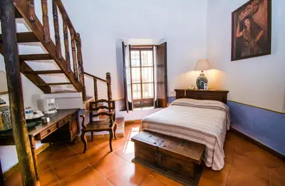 Cama o camas de una habitación en Meson del Alferez Xalapa