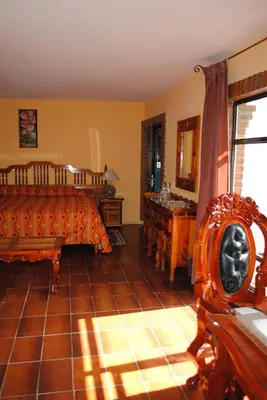 Cama o camas de una habitación en Hotel Boutique Posada la Casona de Cortés