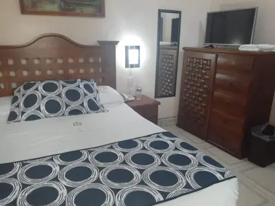 Cama o camas de una habitación en Hotel Imperial Jojutla