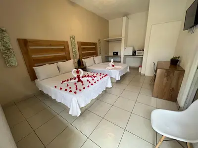 Cama o camas de una habitación en Condominios JAROJE Huatulco