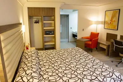 Cama o camas de una habitación en Econo Express Hotel