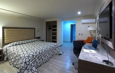 Cama o camas de una habitación en Econo Express Hotel