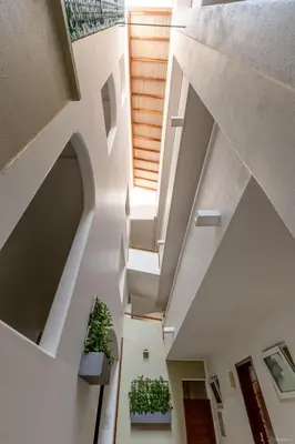 Una televisión o centro de entretenimiento en Hotel Blater