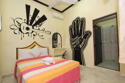 Cama o camas de una habitación en Hotel Posada Diamante