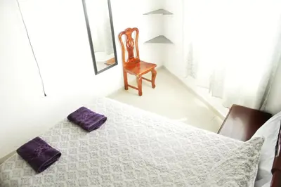 Cama o camas de una habitación en Hotel Posada Sernichari