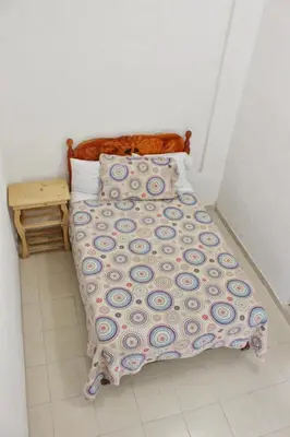 Cama o camas de una habitación en Hotel Posada Sernichari